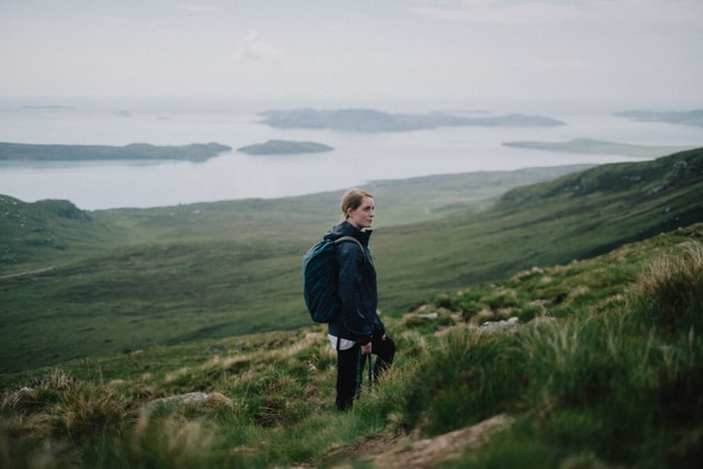 hiking person in scottish mountain
