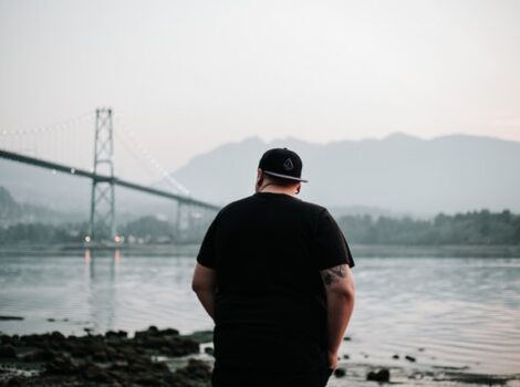 man looking into the distance at San Francisco bridge